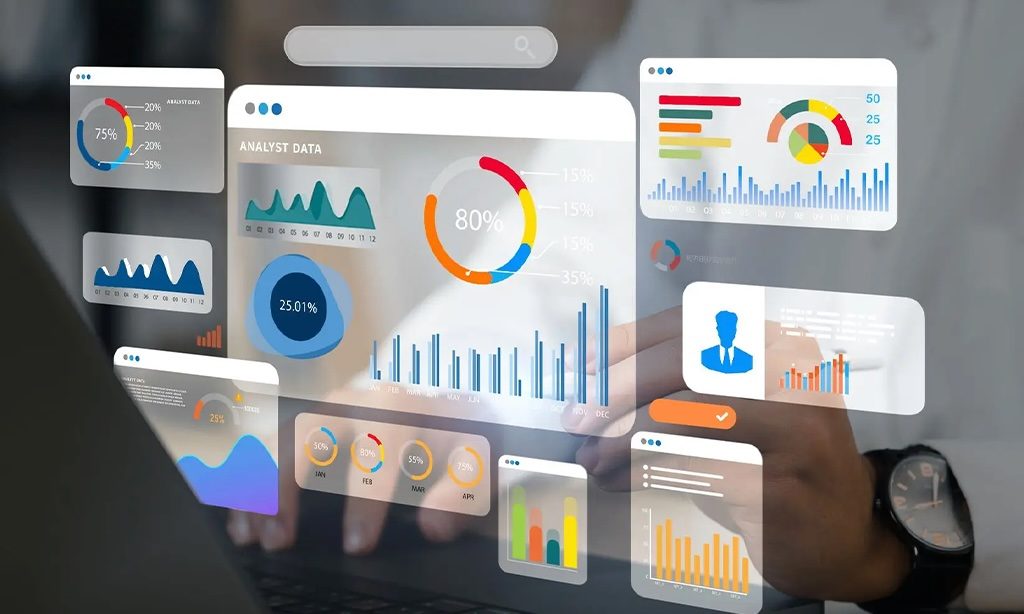 Analyst dashboards over a laptop: charts and performance data